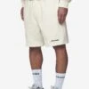 Logo Heavy Sweat Shorts Washed Salty Cream Black Gum